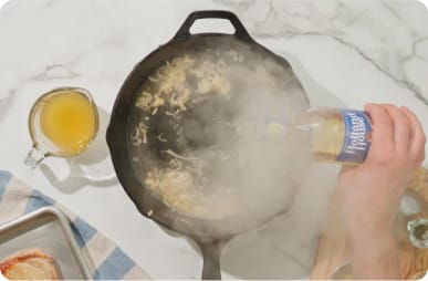 Add Holland House Cooking Wine. 